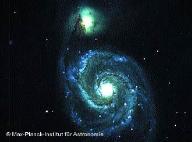 La galaxia Messier 51, en la constelacin de Canes Venatici y su hermana menor: se estima que hay cien mil millones de galaxias en el universo observable.